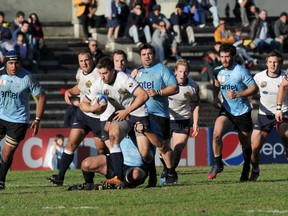 Brock Staller carries the ball into contact for the BC Bears against Uruguay in Montevideo. (Juan Manuel Ramos/El Observador)