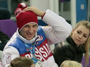 Kirilenko + Ovechkin? Nyet. (AP Photo/Ivan Sekretarev, File)