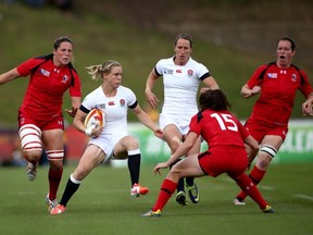 The likes of Kelly Russell (left) and Elissa Alarie (right, 15) have been key players in Canada's strong defensive effort so far at the Women's Rugby World Cup. (Photo by Jordan Mansfield/Getty Images)