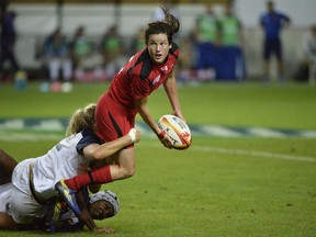 Elissa Alarie played one of the games of her life, especially after she was forced to scrum half from her usual full back position. FRED DUFOUR/AFP/Getty Images