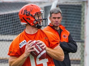 Jacques Chapdelaine, seen keeping a close eye on B.C. Lions' quarterback Travis Lulay last season, brings a varied offence to his new role as head coach of the SFU Clan. (PNG photo)