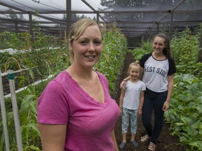 Cathy Finley with her daughters Lauren and Jessica at Laurica Farm in Aldergrove.