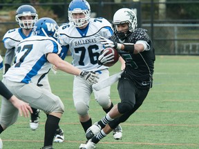 Mission Roadrunners’ quarterback Jesse Walker, one of the most elusive players in the province, begins the season with his team sitting atop The Province’s Big 5 Double A rankings. (Photo — Rod Wiens, motioninsports.com)