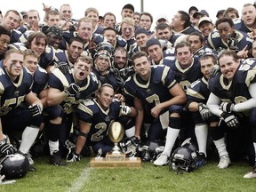 The UBC Thunderbirds celebrate their victory over SFU  in the 2006 Shrum Bowl. (PNG photo)