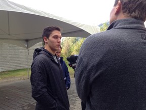 Bo Horvat talks to reporters outside Canucks camp Friday.