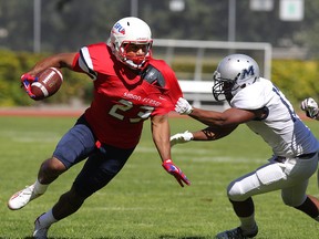 SFU's Lemar Durant, always tough to tackle, caught 11 passes for 151 yards and one TD Saturday in the Clan's loss to Menlo College. (Ron Hole, SFU athletics)