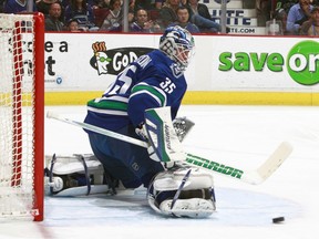 Jacob Markstrom  makes a save against the Calgary Flames in a game last April. (Photo by Jeff Vinnick/NHLI via Getty Images)