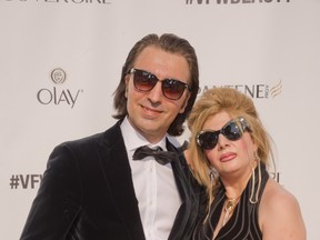 Stylish couple: Valerio Moda's Ali Mokhtarian with his wife at Vancouver Fashion Week where he showcased his much anticipated spring/summer 2015 collection.