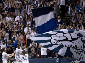 Kendall Watson celebrates his goal with Mauro Rosales, Russell Teibert and Andy O'Brien against the San Joes Earthquakes during second half of MLS soccer action in Vancouver, Wednesday, Sept., 10, 2014. THE CANADIAN PRESS/Jonathan Hayward