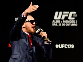 Conor McGregor of Ireland interacts with fans during a Q&A session before the UFC 179 weigh-in  at Maracanazinho on October 24, 2014 in Rio de Janeiro, Brazil.  (Photo by Buda Mendes/Getty Images)
