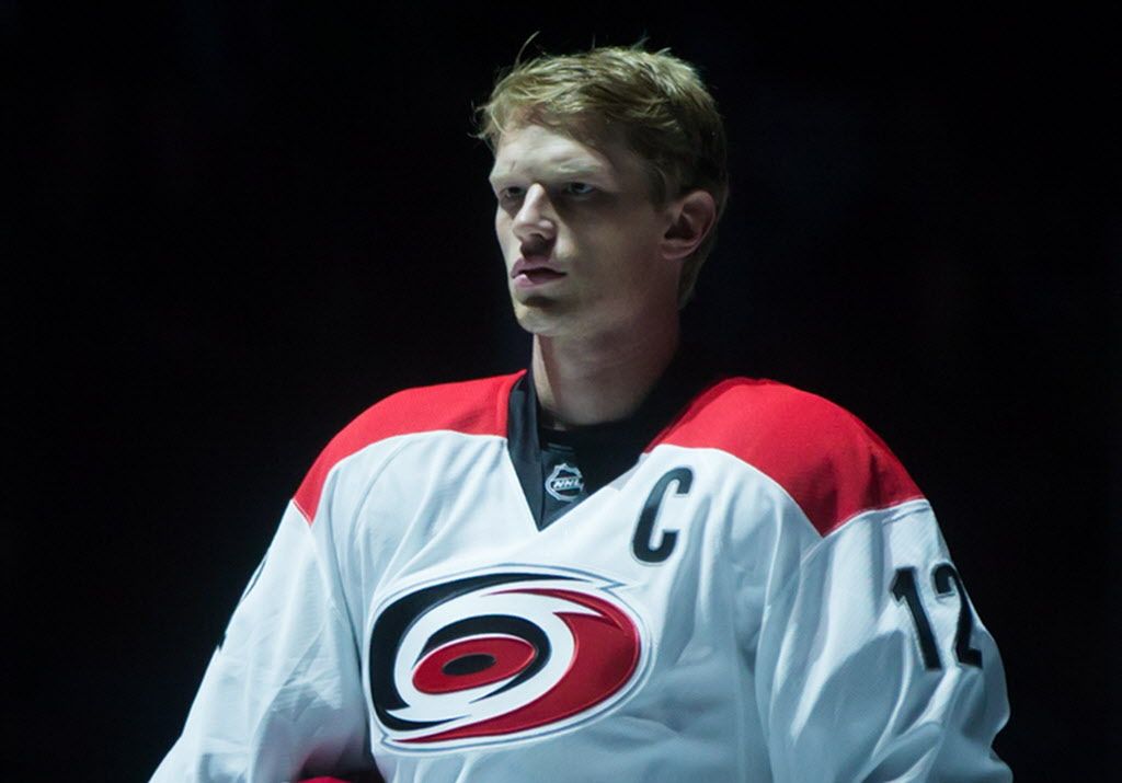 Carolina Hurricanes captain Eric Staal stands during the singing of the national anthems before an NHL hockey game against the Vancouver Canucks in Vancouver, B.C., on Tuesday October 28, 2014. THE CANADIAN PRESS/Darryl Dyck