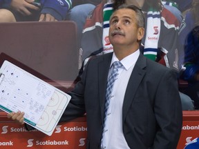 Canucks coach WIllie Desjardins may be seeking divine assistance to help determine his lineup on Thursday in St. Louis. (Photo:THE CANADIAN PRESS/Darryl Dyck)