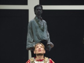 Joan (Meg Roe) gets her orders from above as the Dauphin (Haig Sutherland) looks on. Photo by David Cooper.