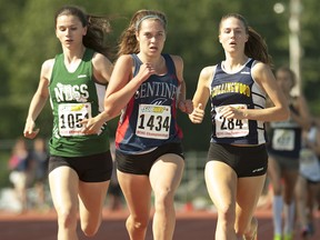 Sentinel Spartans’ Nicole Hutchinson (centre) battles to finish line against Nanaimo District’s Miryam Bassett and Grace Thompson of Collingwood at last spring’s Subway B.C. high school track and field championships. This season, as a senior, Hutchinson is one of the favourites to win the B.C. high school cross country championships. (Photo — Wilson Wong, UBC athletics)