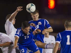 UBC Thunderbirds’ Paul Clerc gets a head on the ball Saturday in front of teammate Sean Einarsson during the ‘Birds 2-0 win over the visiting UBC Okanagan Heat at Thunderbird Stadium. UBC improved to 8-0-0 with the win. (Richard Lam/UBC athletics)