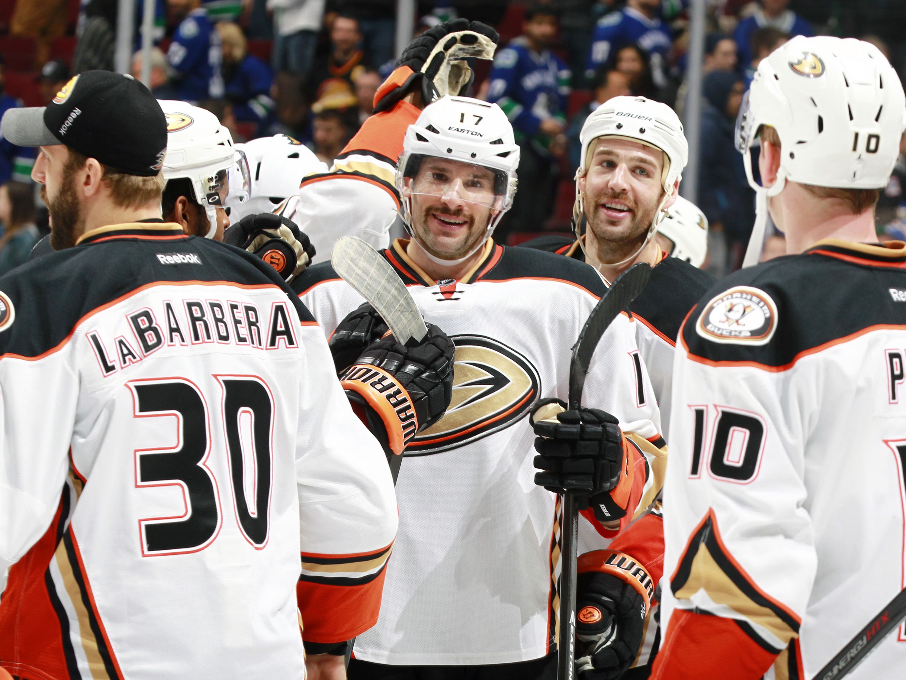 VANCOUVER, BC - NOVEMBER 20: Ryan Kesler #17 and the Anaheim Ducks celebrate a victory over the Vancouver Canucks in their NHL game at Rogers Arena November 20, 2014 in Vancouver, British Columbia, Canada. Anaheim won 4-3 in a shootout. (Photo by Jeff Vinnick/NHLI via Getty Images)