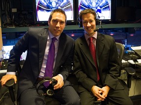 VANCOUVER,BC:NOVEMBER 14, 2014 -- Vancouver Canucks play guy Jon Abbott (right) and colour guy Dave Tomlinson in the broadcast gondola prior to NHL hockey action against the Arizona Coyotes at Rogers Arena in Vancouver, BC, November, 14, 2014. (Richard Lam/PNG)