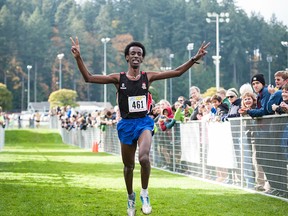 Nathan Tadesse of North Surrey crosses the finish line by himself Saturday in Victoria. (Vid Wadhwani, photo)