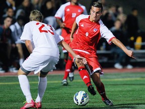 Simon Fraser’s Jovan Blagojevic (right) prepares to dribble past defender Jacob LaPorte of Hawaii Hilo during a non-conference contest played Sept. 9 atop Burnaby Mountain. Blagojevic bagged two goals in a 4-2 Clan victory. (Ron Hole, SFU athletics)