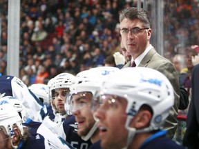 Vancouver Canucks fans were used to seeing Claude Noel in this spot, behind the Winnipeg Jets bench in visits to Rogers Arena. Vancouver Giants fans will become accustomed to him guiding the home team at the Pacific Coliseum. The WHL club is expected to unveil him as their bench boss on Monday. (Getty Images.)