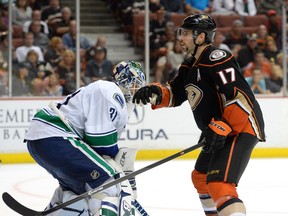 Ryan Kesler seems to give Eddie Lack the business during Vancouver's 2-1 shoot-out win in Anaheim on Nov. 9. (Photo by Harry How/Getty Images)