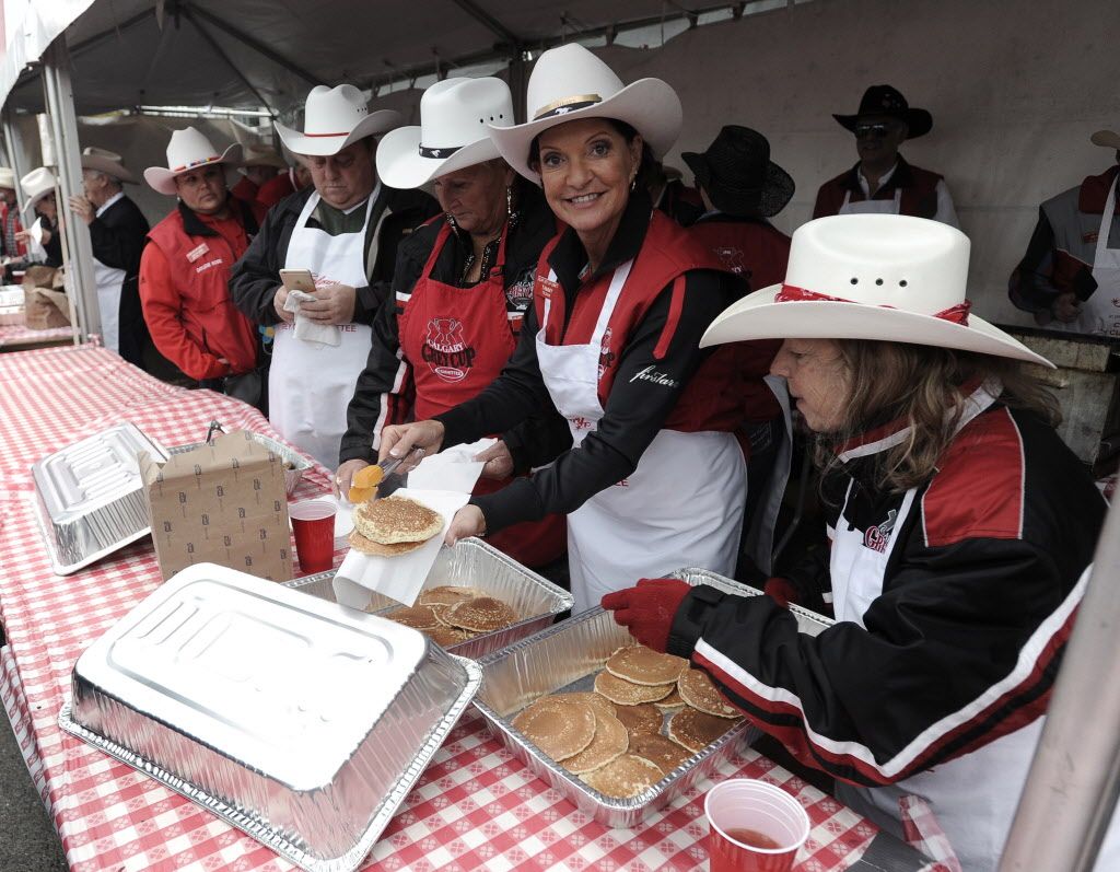 VANCOUVER, BC., November 27, 2014 -- Action from the Calgary Grey Cup Committee's annual Pancake Breakfast  in Vancouver, BC., November 27, 2014.  (Nick Procaylo/PNG)