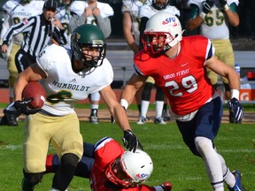 Humboldt State receiver Josh Meier (left) looks for sme extra yardage under the eye of SFU's Alex Iezzi during GNAC contest Saturday at Burnaby's Swangard Stadium. (Steve Frost, SFU athletics)