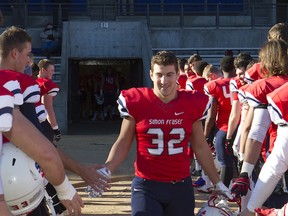 Clan senior running back Stephen Spagnuolo makes his way out of the tunnel in SFU colours for the final time on Saturday at Swangard. (Ron Hole, SFU athletics)