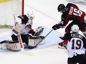 Thomas Foster, stymied here by Prince George goalie Ty Edmonds in an Oct. 18 game in Vancouver, helped the Giants to a comeback win in Prince George on Tuesday. (Photo by Ben Nelms/Getty Images)