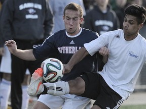 Panorama Ridge’s Kerman Pannu had a leg up on Ty Powell and the rest of the Sutherland Sabres on Saturday, leading his school to its first-ever B.C. Triple A boys soccer title at Burnaby Lakes. (Nick Procaylo, PNG)