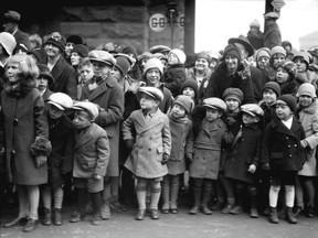 Children waiting streetside for the 1927 Spencer's Toy Parade in Vancouver (Vancouver Archives photo)