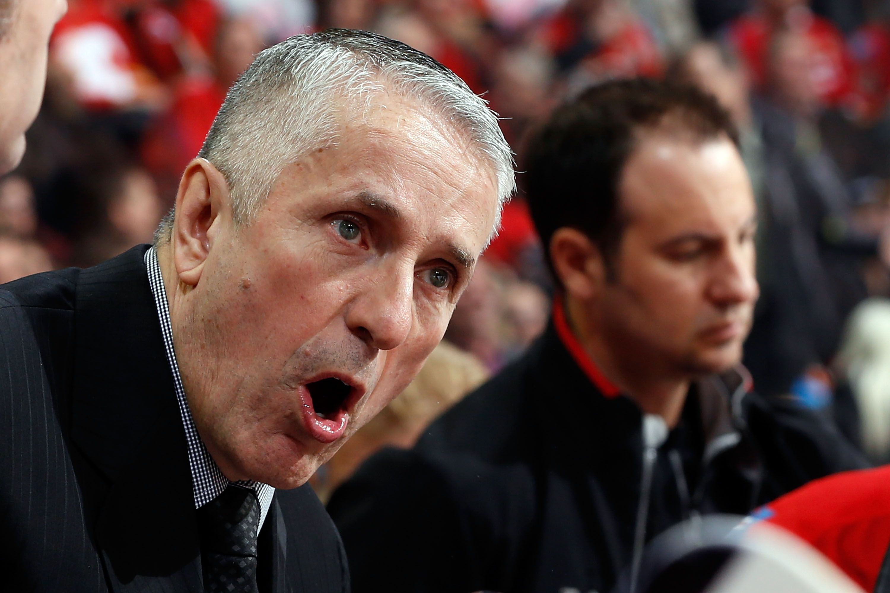 CALGARY, AB - MARCH 12: Head Coach Bob Hartley of the Calgary Flames instructs his players during a stoppage in play in the game against the Anaheim Ducks at Scotiabank Saddledome on March 12, 2014 in Calgary, Alberta, Canada. (Photo by Gerry Thomas/NHLI via Getty Images)