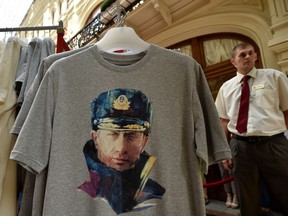 This picture taken on August 11, 2014 shows T-shirts with portraits of Russia's President Vladimir Putin, in a shop in central Moscow. This new collection of T-shirts with Putin's portrait was selling in the Russian capital for 1200 rubles. (KIRILL KUDRYAVTSEV/AFP/Getty Images)