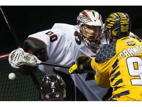 Goaltender Tyler Richards, here facing Minnesota's Callum Crawford, will be crucial to the Vancouver Stealth this coming NLL season. (Province Files.)