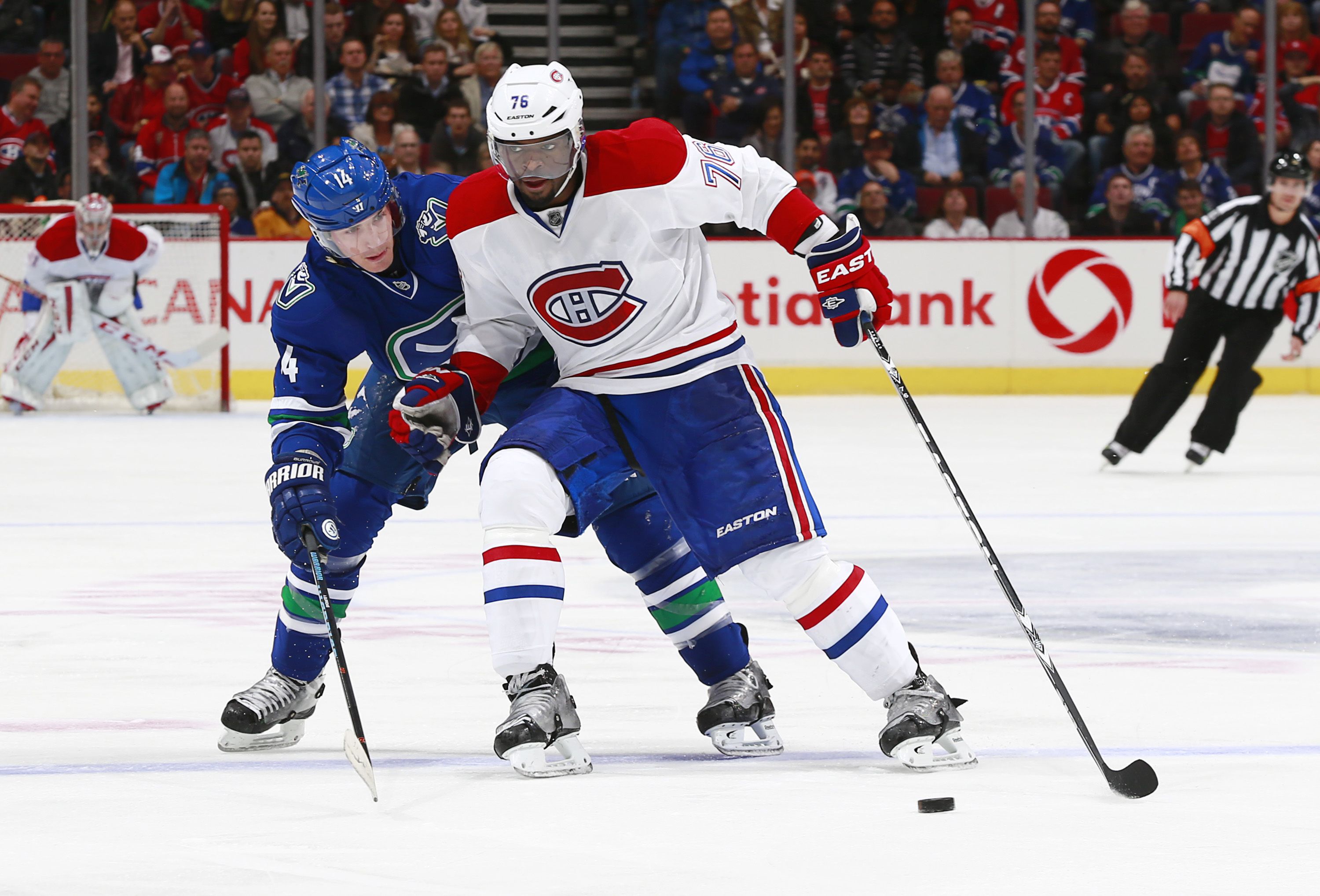 Canucks winger Alex Burrows checks Canadiens d-man P.K. Subban during Montreal’s visit to Rogers Arena on Oct. 30. Vancouver won 3-2 in OT that night. (Photo by Jeff Vinnick/NHLI via Getty Images)