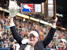 Chris Hall, hoisting the NLL championship, after the Washington Stealth's win in the 2010 league finale. (NLL photo.)