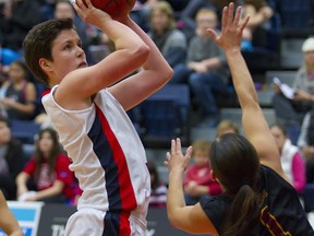 SFU's Erin Chambers attempts a shot against CSU-DH guard Breanne Garcia on Saturday in NCAA D2 women's non-confernece play atop Burnaby Mountain. (Ron Hole, SFU athletics)