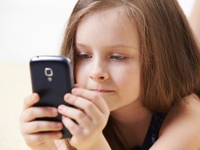 little girl with mobile phone