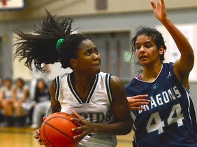 Riverside Rapids' Ozi Nwabuko (left) attempts to drive past Simran Grewal of Fleetwood Park during action Friday at A Tournament For Emily in Port Coquitlam, (PNG photo)