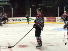 Brennan Menell showing off the Ugly Christmas Sweater jerseys the Giants wore on Saturday. (Steve Ewen photo.)