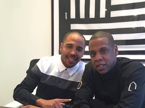 Former boxing champion Andre Ward, (left) has signed a lucrative contract with rap legend Jay-Z. Photo taken from Andre Ward's Twitter post.