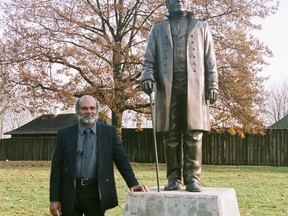 Writer Clyde Duncan, past president of the Guyanese Canadian Cultural Association of British Columbia, stands with statue of Sir James Douglas, B.C.’s first governor, at Fort Langley.
(SUBMITTED PHOTO)