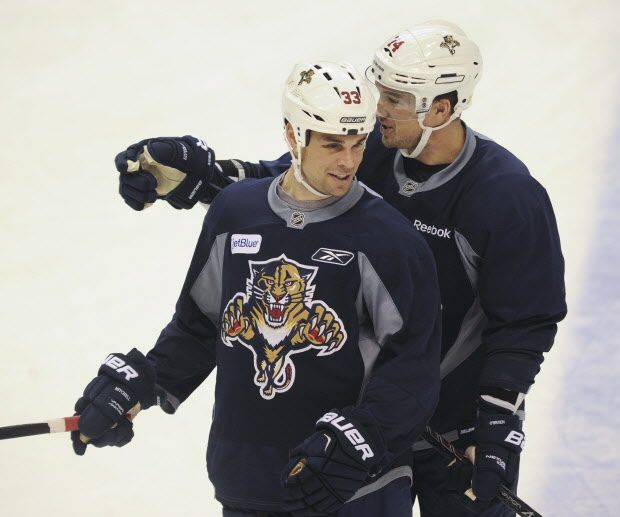 Vancouver, BC: JANUARY 07, 2015 -- Florida panthers practice at Rogers Arena Wednesday, January 7, 2015. Pictured is Willie Mitchell (left) and Shane O'Brien.  (Photo by Jason Payne/ PNG) (For story by reporters)  [PNG Merlin Archive]