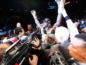 Deontay Wilder holds his hands high as the first American heayvweight world champion in almost eight years. Photo: Esther Lin/SHOWTIME
