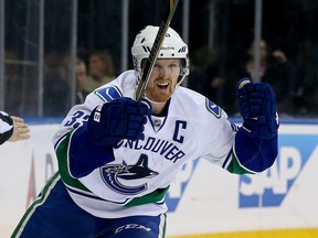 Henrik Sedin celebrates on Thursday night at Madison Square Garden.