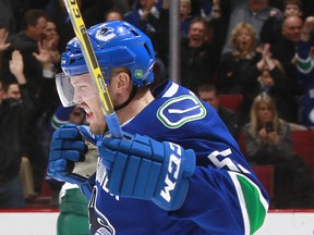 In 2014-15, Alex Biega scored the winner for the Vancouver Canucks in his first NHL game after playing 313 in the minors. (Getty Images.)
