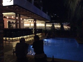 By the pool at the Base Villa Hotel in Phnom Penh.