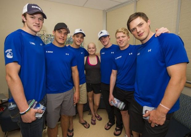 A lineup of Canucks prospects visited Children's Hospital patient Olivia last July. From left: Thatcher Demko, Bo Horvat, Jake Virtanen, Jared McCann, Hunter Shinkaruk and Brendan Gaunce.