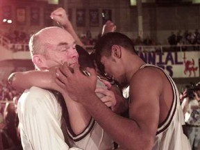 Richmond head coach Bill Disbrow is mobbed by Gil Cheung and Pasha Bains after Colts won the 1998 BC boys Triple A title. (PNG file photo)