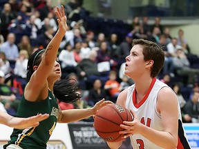 SFU's Erin Chambers looks for breathing room against UAA'sAlli Madison on Thursday at the West Gym. (Ron Hole, SFU athletics)